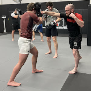 Students learning how to strike.